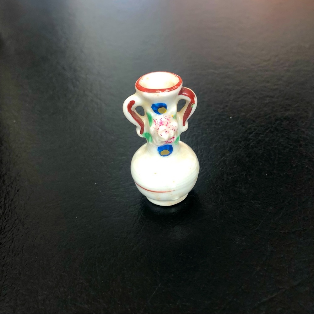 Ceramic vase with rose detail. Marked Japan on bottom